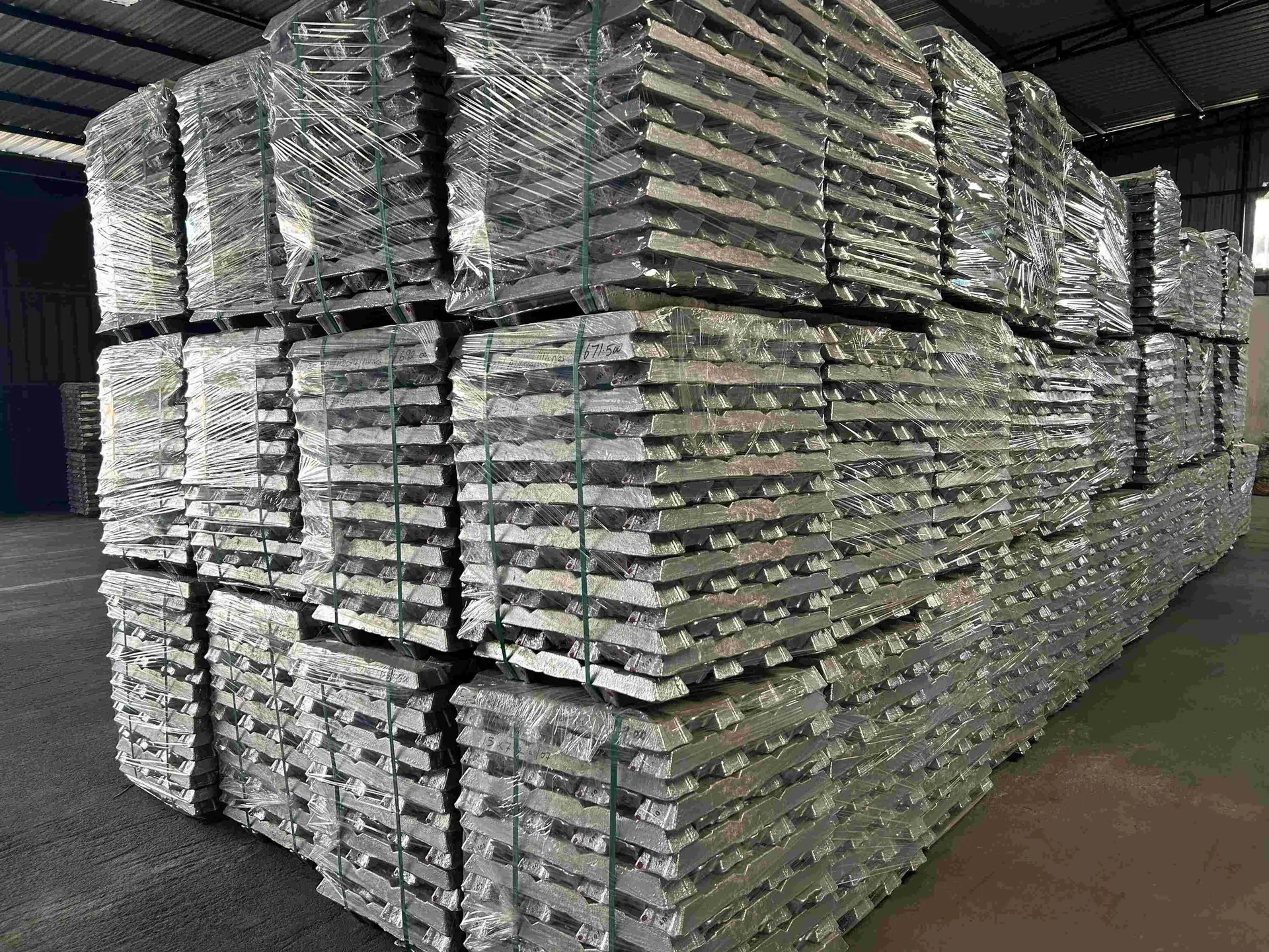 Finished aluminium alloy ingots stacked in the PSY Metal & Alloy warehouse